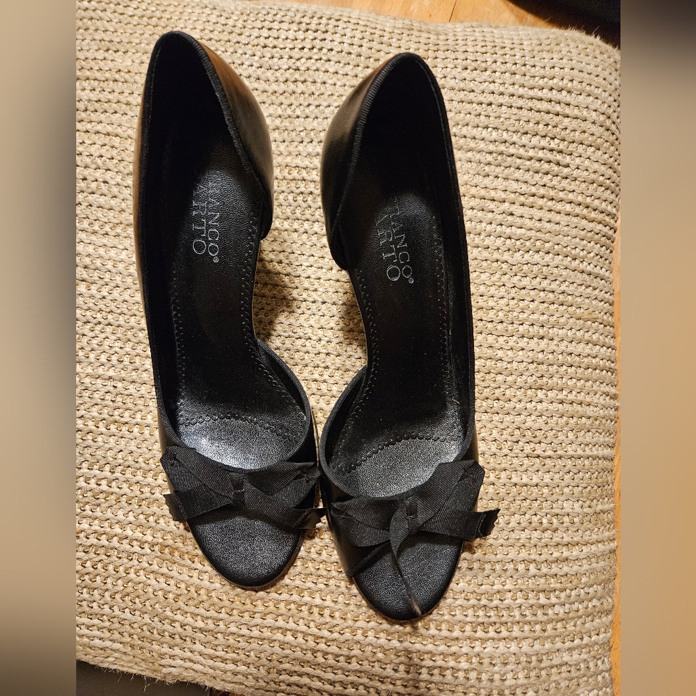 Franco Sarto black bow pep toe heels.